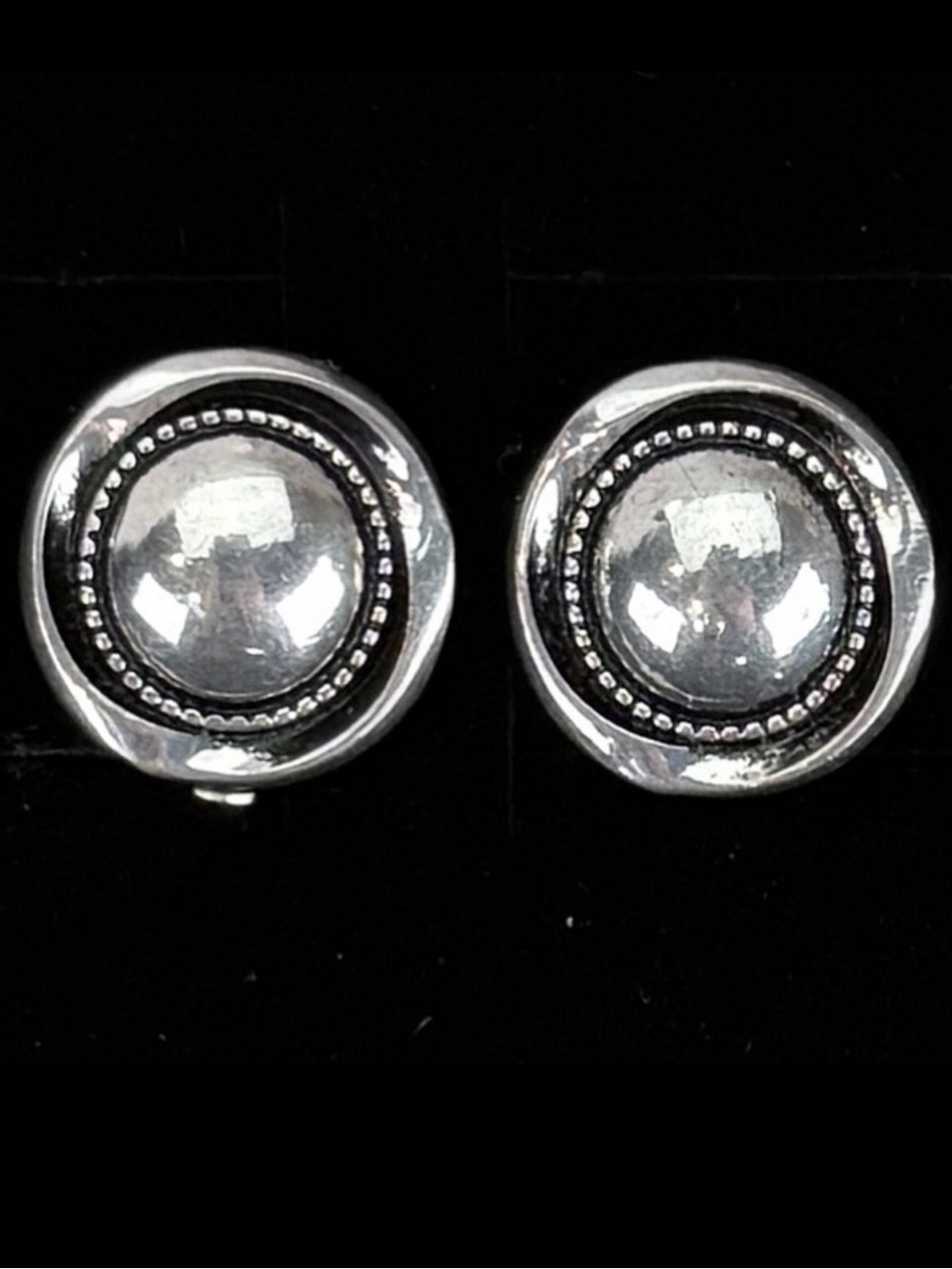 Vintage Silvertone round weighted clip on earrings